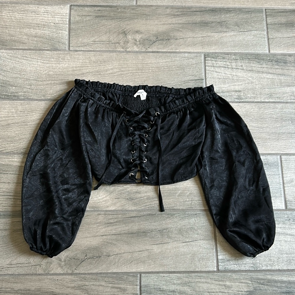 In the beginning lace up top